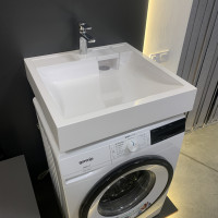 Умивальник над пральною машиною – економія простору для маленької ванної кімнати